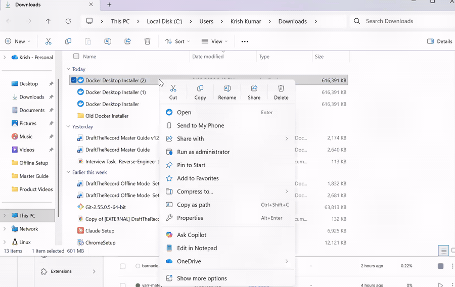 Right-clicking the Docker Desktop installer in the Downloads folder and choosing Run as administrator.